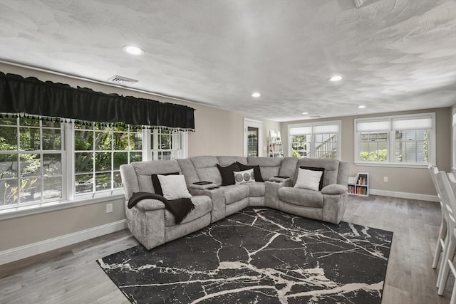 369 Vernon St, Wakefield, MA 01880 - living area with recessed lighting and wood finished floors