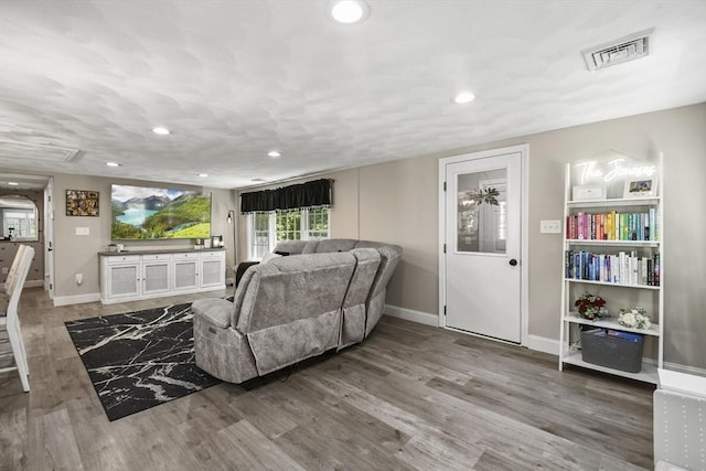 369 Vernon St, Wakefield, MA 01880 - living area with wood finished floors and recessed lighting