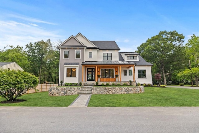 1 Maud Graham Cir, Burlington, MA 01803 - modern farmhouse with a standing seam roof, covered porch, a metal roof, and board and batten siding