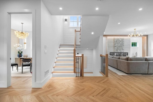 1 Maud Graham Cir, Burlington, MA 01803 - stairway with a chandelier, recessed lighting, and a fireplace
