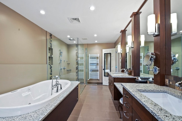 bathroom with vanity, tile patterned floors, and separate shower and tub