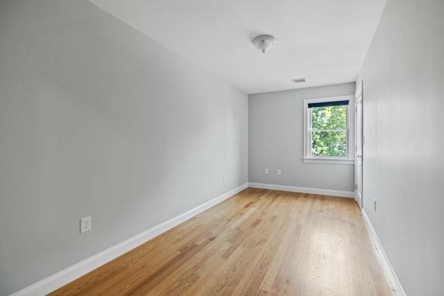 125 Ash St Unit 1, Waltham, MA 02453 - unfurnished room with light wood-style flooring and baseboards