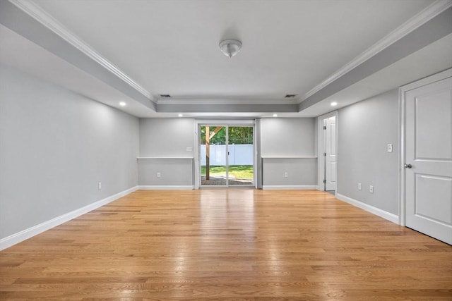 125 Ash St Unit 1, Waltham, MA 02453 - empty room featuring a raised ceiling, ornamental molding, light wood finished floors, and recessed lighting