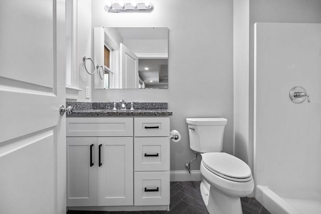 125 Ash St Unit 1, Waltham, MA 02453 - full bath featuring vanity, a shower, and tile patterned floors
