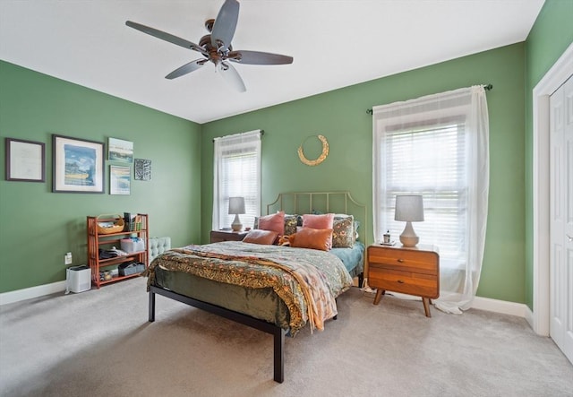 49 Camden St Unit 49, South Hadley, MA 01075 - bedroom featuring light colored carpet, multiple windows, and baseboards