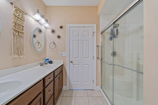 49 Camden St Unit 49, South Hadley, MA 01075 - full bathroom with a shower with shower door, double vanity, tile patterned flooring, and baseboards