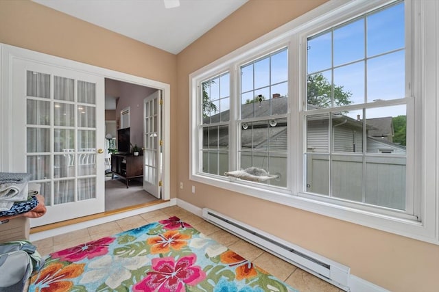 49 Camden St Unit 49, South Hadley, MA 01075 - sunroom with baseboard heating, healthy amount of natural light, and french doors