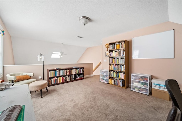49 Camden St Unit 49, South Hadley, MA 01075 - living area featuring carpet, ceiling fan, lofted ceiling, and a textured ceiling