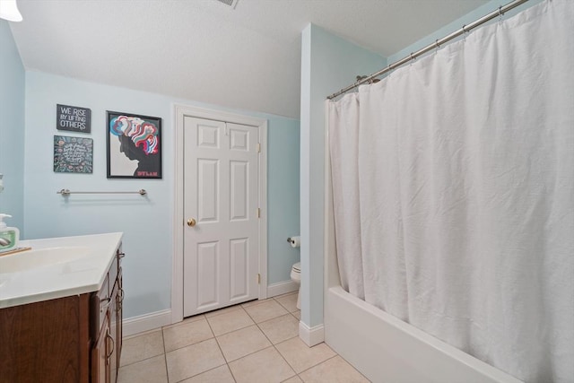 49 Camden St Unit 49, South Hadley, MA 01075 - full bath with tile patterned floors, vanity, toilet, baseboards, and shower / tub combo