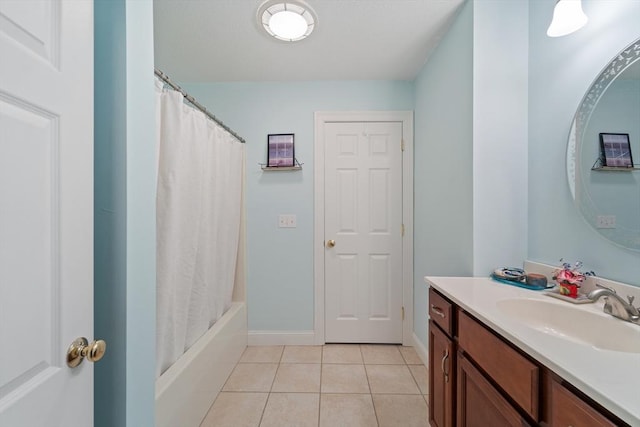 49 Camden St Unit 49, South Hadley, MA 01075 - full bathroom featuring vanity, tile patterned floors, baseboards, and shower / tub combo with curtain