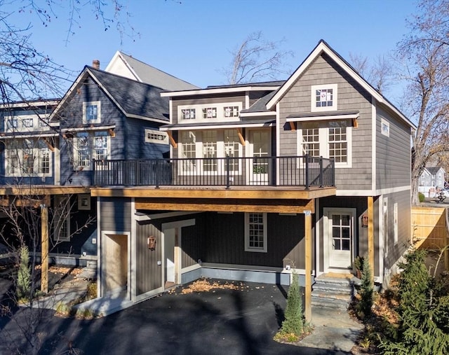 view of front of home with aphalt driveway