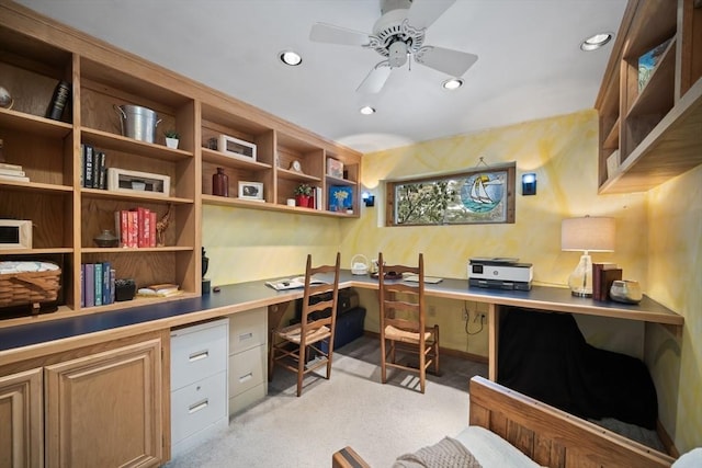 office space featuring light carpet, ceiling fan, built in study area, and recessed lighting