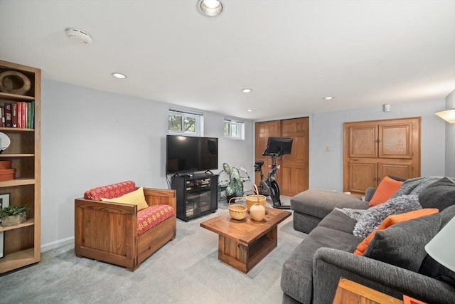 living room featuring recessed lighting and light colored carpet