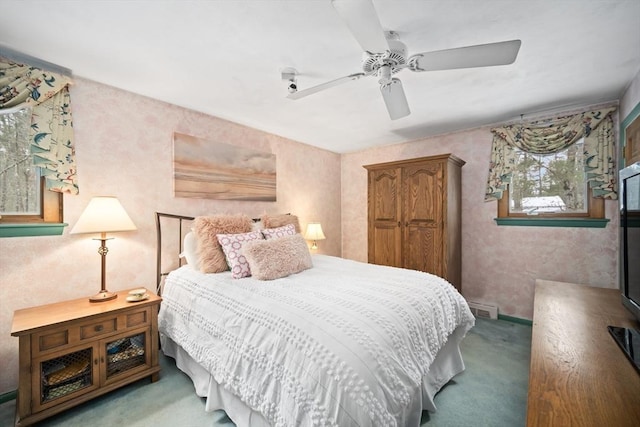 bedroom featuring ceiling fan, carpet flooring, and visible vents