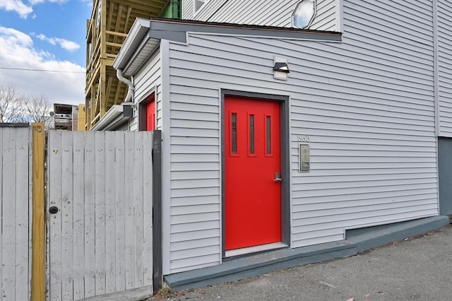 property entrance featuring fence