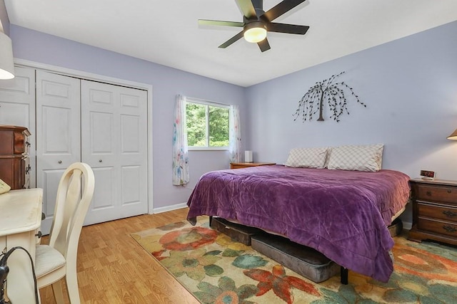 750 Whittenton St Unit 1012, Taunton, MA 02780 - bedroom with wood finished floors, a closet, ceiling fan, and baseboards