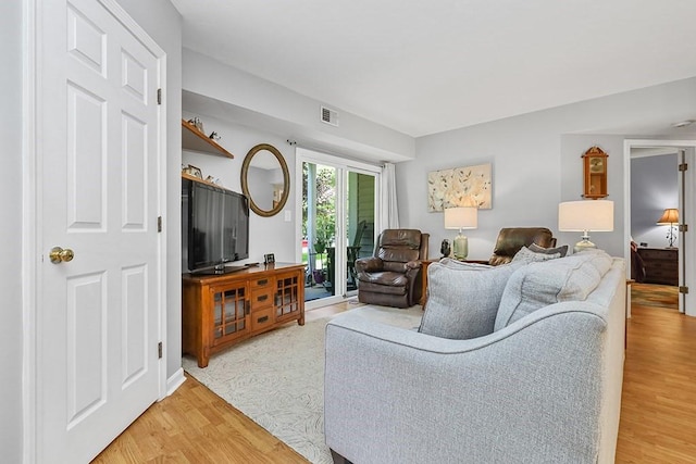 750 Whittenton St Unit 1012, Taunton, MA 02780 - living room with light wood-style flooring