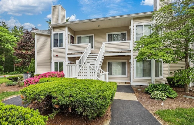 750 Whittenton St Unit 1012, Taunton, MA 02780 - view of property featuring stairway and cooling unit