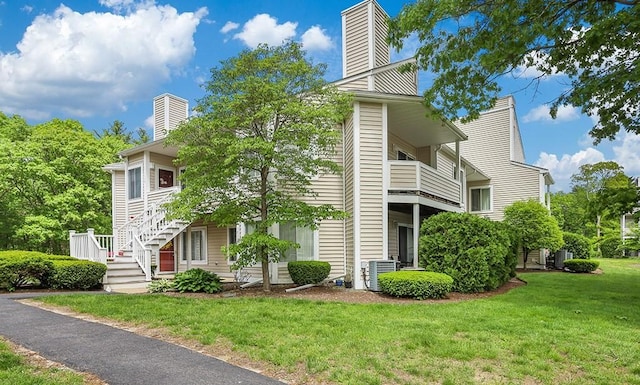 750 Whittenton St Unit 1012, Taunton, MA 02780 - view of property featuring central AC unit and stairway