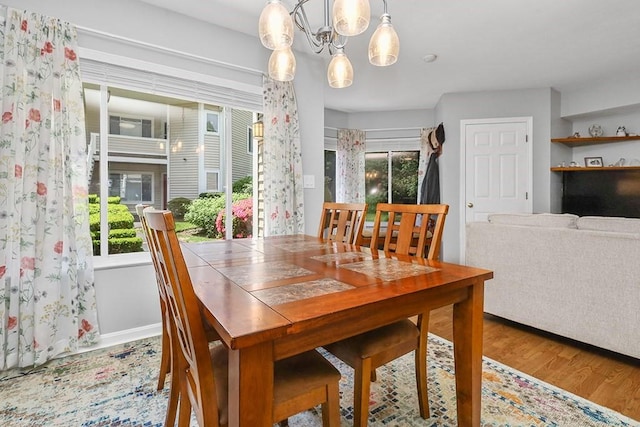 750 Whittenton St Unit 1012, Taunton, MA 02780 - dining area with wood finished floors and a chandelier