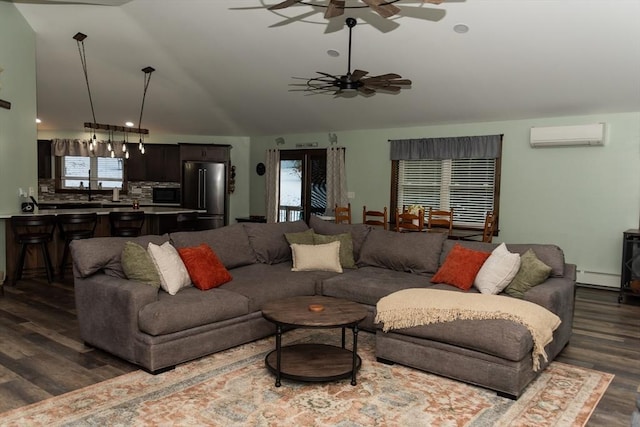 living room with lofted ceiling, a wall mounted AC, dark hardwood / wood-style floors, and a baseboard heating unit