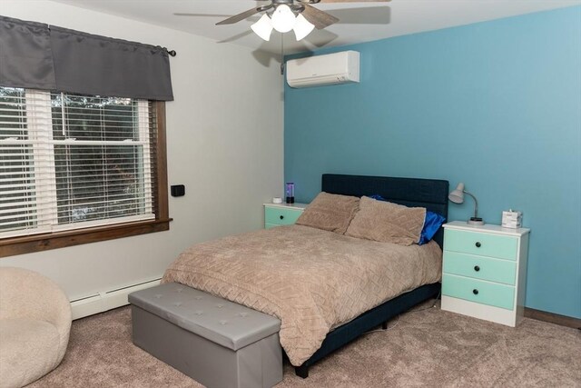 carpeted bedroom featuring ceiling fan, a baseboard radiator, and a wall unit AC