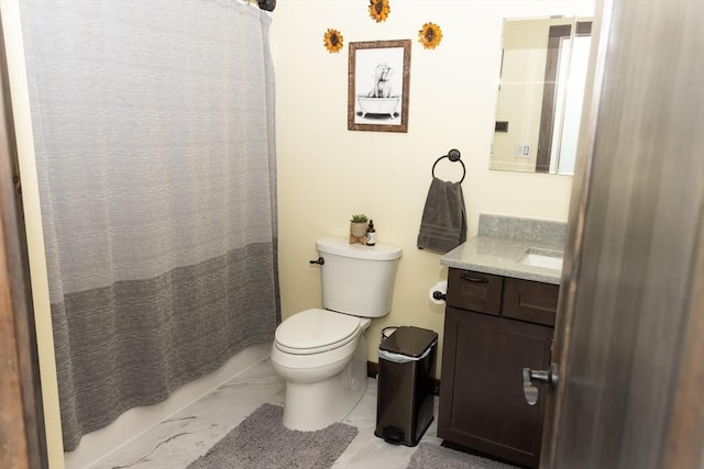 bathroom with toilet and vanity