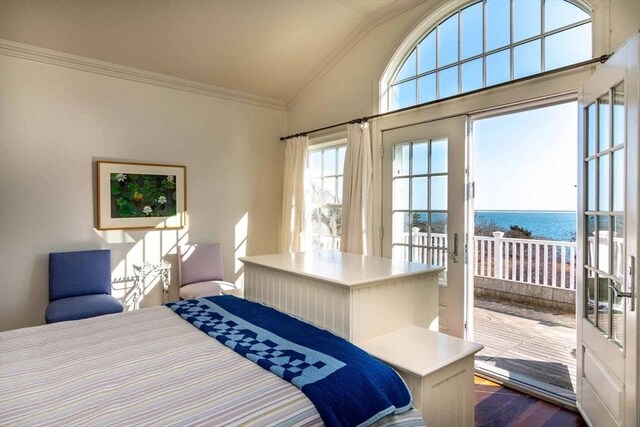 25 Lelands Path, Edgartown, MA 02539 - bedroom with vaulted ceiling, multiple windows, ornamental molding, a water view, and dark wood-style flooring