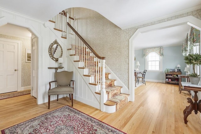 staircase with wood-type flooring