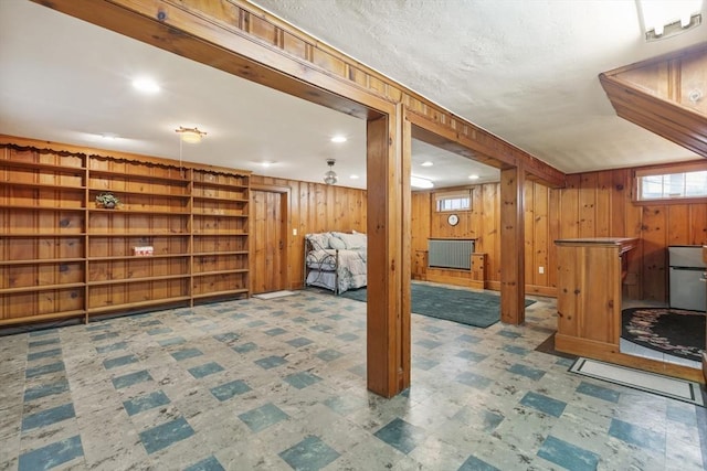 basement with wood walls