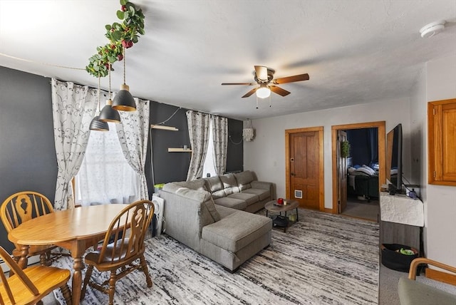 living room with ceiling fan