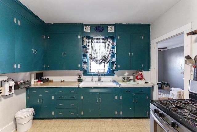 kitchen with sink and stainless steel gas stove