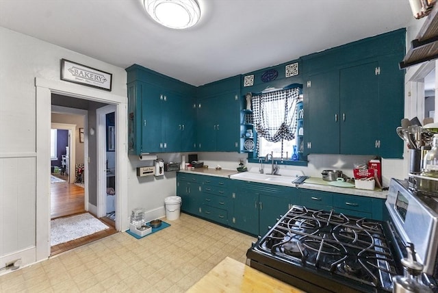 kitchen featuring sink and range with gas stovetop