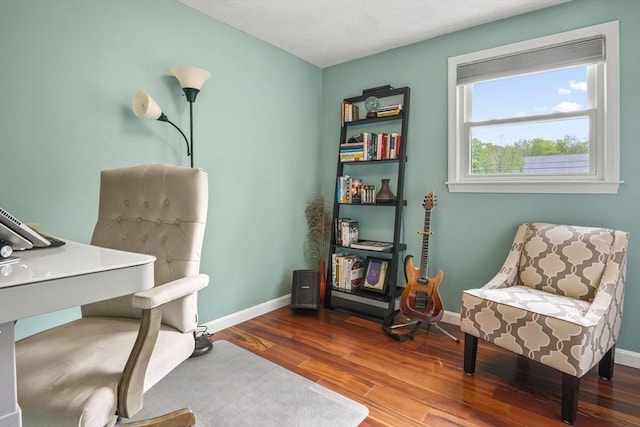 office space featuring wood finished floors and baseboards