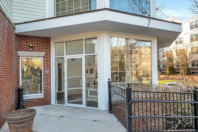 property entrance with a patio