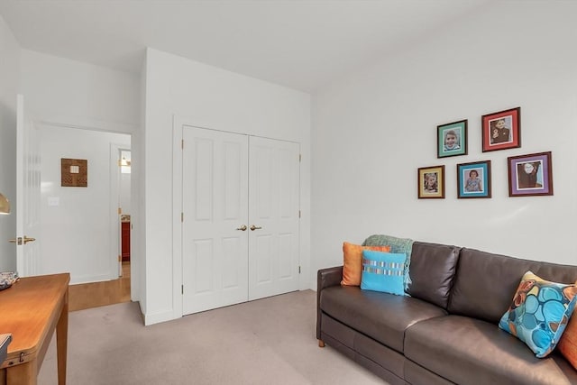 living room featuring light colored carpet