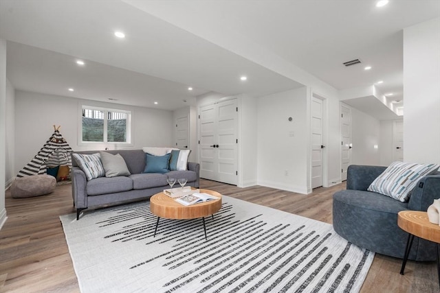27 Johnson Pl Unit 27, Newton, MA 02466 - living area featuring light wood finished floors and recessed lighting