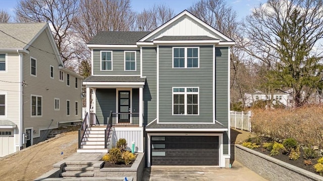 view of front of house featuring stairway, roof with shingles, an attached garage, concrete driveway, and board and batten siding