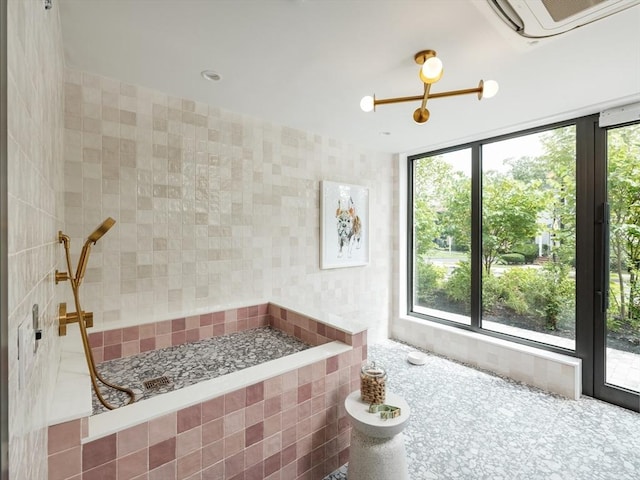 bathroom featuring tile walls