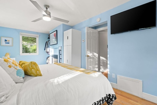 15 University Rd, Arlington, MA 02474 - bedroom featuring light wood-style floors, ceiling fan, and baseboards