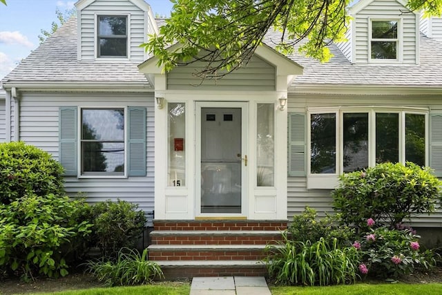 15 University Rd, Arlington, MA 02474 - view of front of house with entry steps and roof with shingles