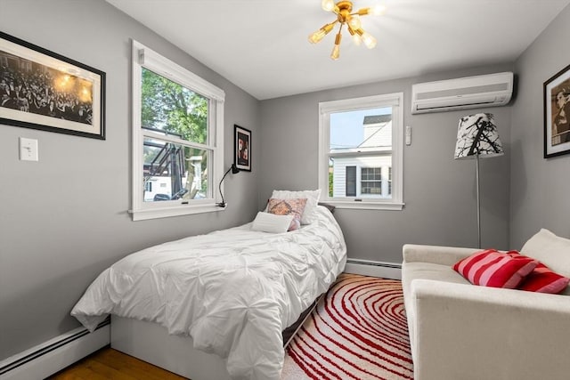 15 University Rd, Arlington, MA 02474 - bedroom with a wall mounted AC, baseboard heating, and multiple windows