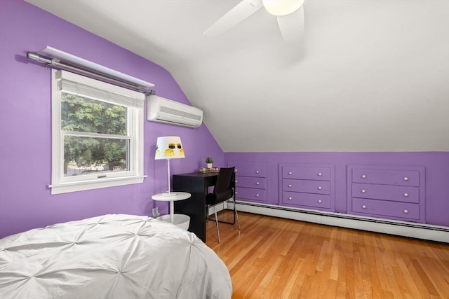 15 University Rd, Arlington, MA 02474 - bedroom with a wall mounted AC, lofted ceiling, a baseboard heating unit, wood finished floors, and ceiling fan