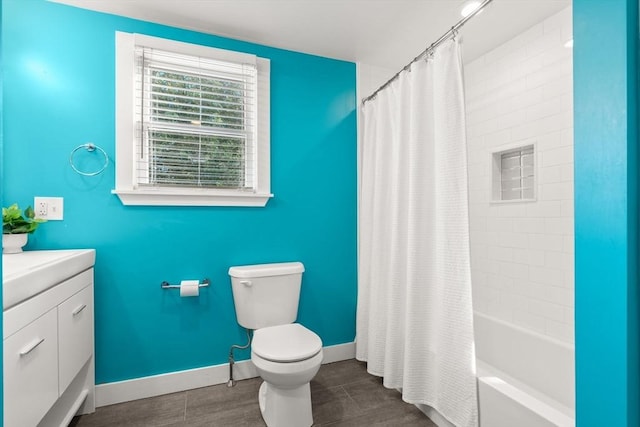 15 University Rd, Arlington, MA 02474 - full bathroom featuring toilet, vanity, shower / bath combo with shower curtain, and baseboards