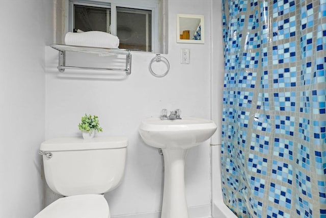 15 University Rd, Arlington, MA 02474 - full bathroom with a shower with shower curtain and toilet