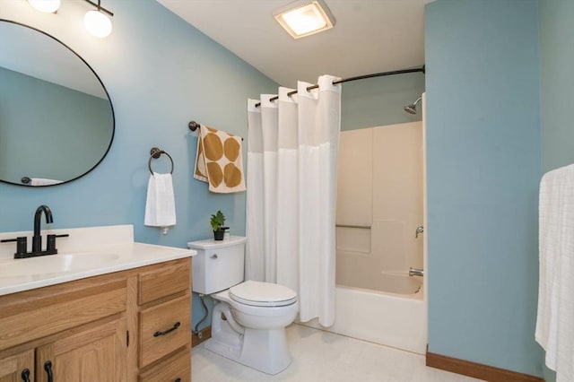 bathroom featuring shower / bath combo, vanity, and toilet