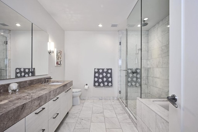 bathroom with a stall shower, visible vents, toilet, marble finish floor, and vanity