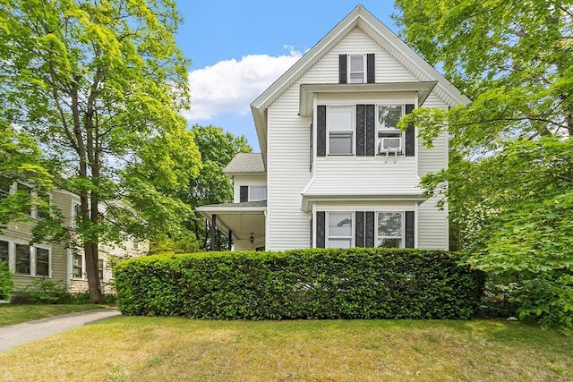 20 Walden St, Lowell, MA 01851 - traditional-style home with a front lawn
