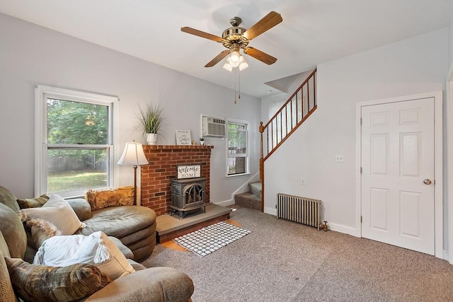 20 Walden St, Lowell, MA 01851 - living area featuring radiator, stairway, ceiling fan, carpet, and baseboards