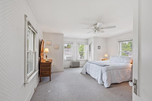 20 Walden St, Lowell, MA 01851 - bedroom featuring radiator, multiple windows, carpet floors, and wallpapered walls